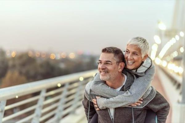 Photo of Happy mature couple havin<em></em>g fun in the city on a autumn day