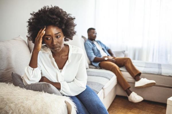 Unhappy Couple After an Argument in the Living Room at Home