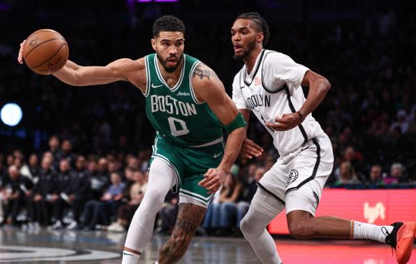 Jayson Tatum loses the ball as Ziaire Williams defends during the Nets' loss.