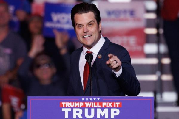 Republican U.S. Representative Matt Gaetz speaking at a Trump campaign rally in Henderson, Nevada, pointing at a microphone