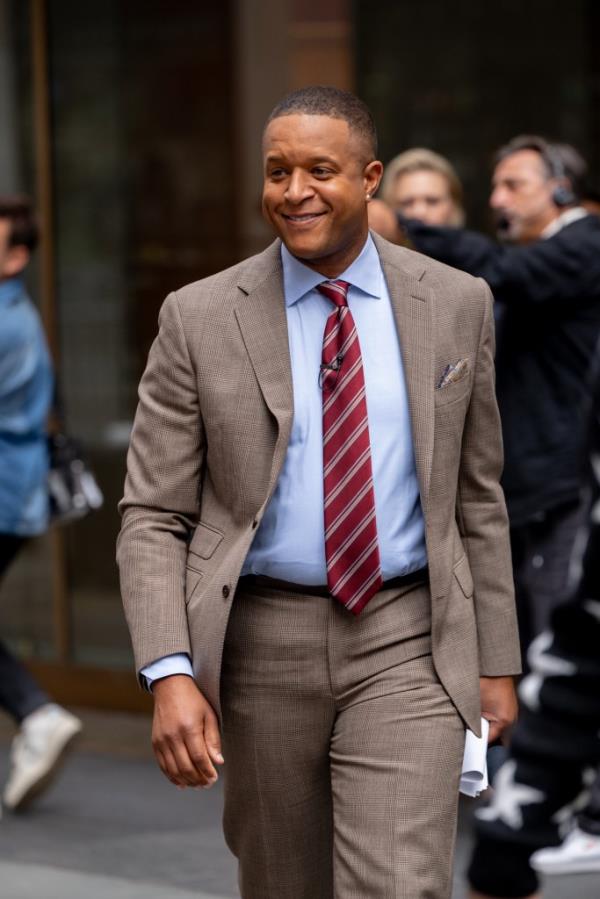 Craig Melvin walking and smiling on Monday, September 30, 202. 