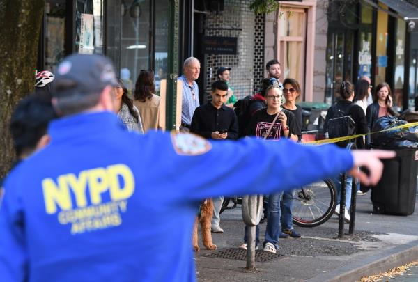 NYPD directing people at the scene.