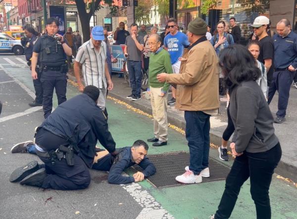 Boris Shapiro lying on West 69th Street after being shot by a former co-worker from a computer repair store in daylight on November 7, 2024.