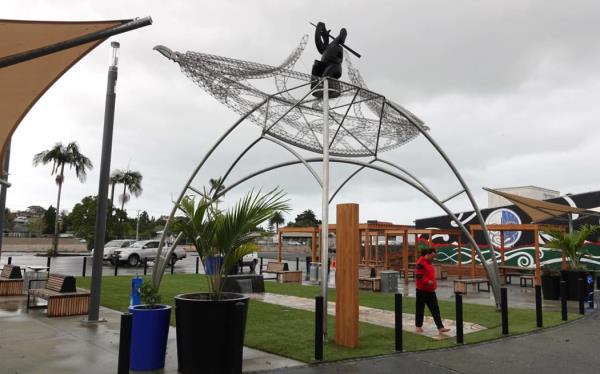 The centrepiece of Kaitāia's new town square is a stainless steel and tōtara waka sculpture by BJ Natanahira.