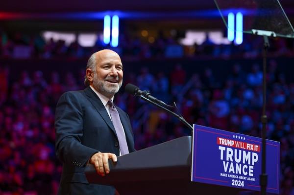 Wall Street financier Howard Lutnick speaks at Do<em></em>nald Trump’s rally at Madison Square Garden in October 2024. Photograph: The New York Times
                      