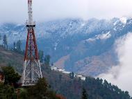 Snow covered Himalayan ranges as seen from Kullu. (PTI Photo)