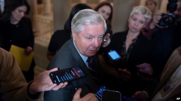 Senator Lindsey Graham, the ranking member of the Senate Judiciary Committee, comments to reporters at the Capitol in Washington, Nov. 20, 2024.