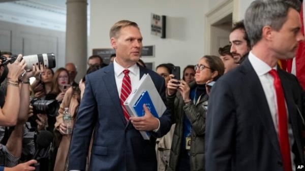 House Ethics Committee Chairman Representative Michael Guest, center, arrives for a meeting of the House Ethics Committee, on Capitol Hill in Washington, Nov. 20, 2024.