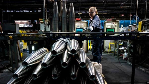 FILE - A steelworker moves an artillery projectile during the manufacturing process at the Scranton Army Ammunition Plant in Scranton, Pennsylvania, on April 13, 2023. The U.S. Defense Department said last week that some weapons deliveries to Ukraine will take mo<em></em>nths to complete.