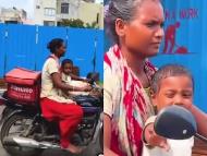 The woman delivers food in and around Rajkot with her baby sitting in front of her on her bike. (IMAGE: INSTAGRAM/@vishvid)