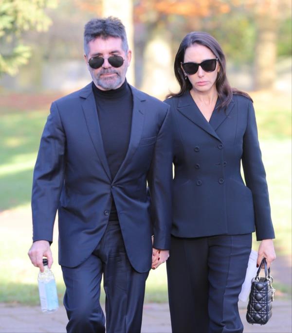 Simon Cowell and fiancee Lauren Silverman pictured leaving the late singer Liam Payne's Funeral in Amersham, Buckinghamshire.