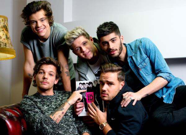 Zayn Malik, Liam Payne, Louis Tomlinson, Niall Horan and Harry Styles from One Direction pose as they attend the book signing of One Direction's new book 'Wher<em></em>e We Are' held at Alexandra Palace on November 18, 2013 in London, England.