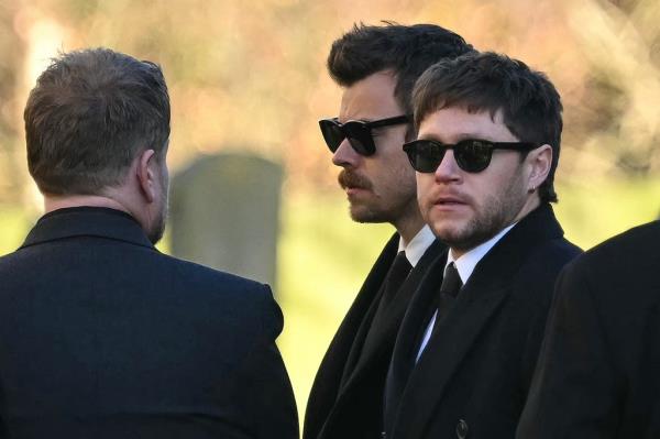 Former One Direction band members Harry Styles (C) and Niall Horan leave after attending the funeral service of the late One Direction singer Liam Payne, at a St Mary's church in Amersham, west of Lo<em></em>ndon on November 20, 2024.