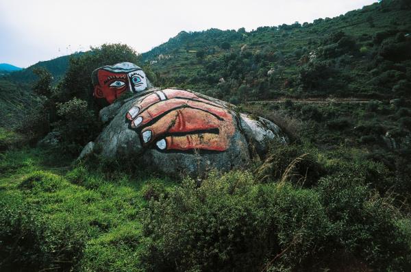 A painting on a massive rock by a local artist which shows the depth and beauty of Sardinia's natural landscape.