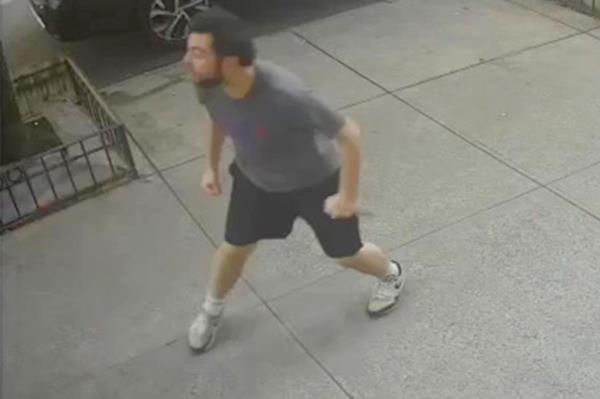 The suspect was caught on camera sprinting after the victim before slashing him across the face Wednesday